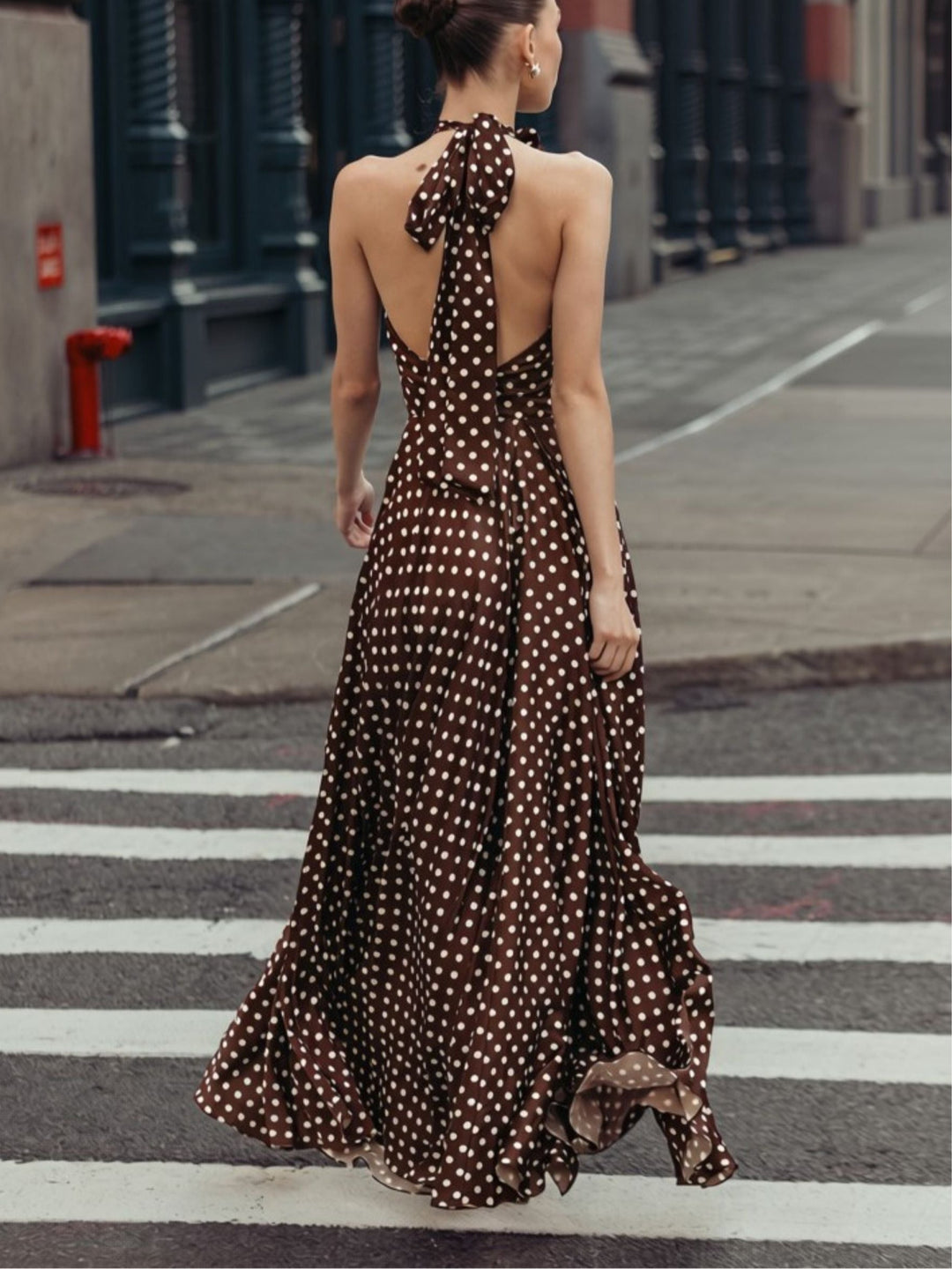 Brown halter-neck maxi dress with polka dots and 3D floral details
