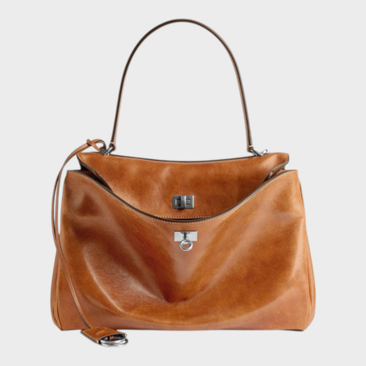 Curved Leather Handbag with Adjustable Shoulder Strap